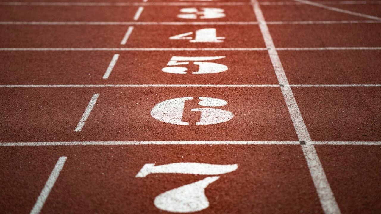 Lane numbers painted on a running track